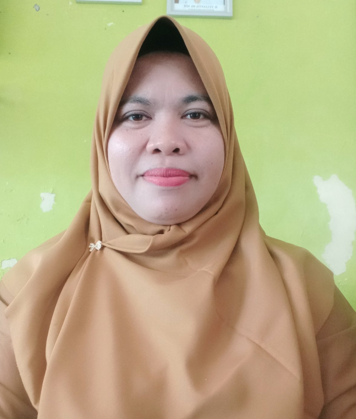Yuhilda, S.Pd